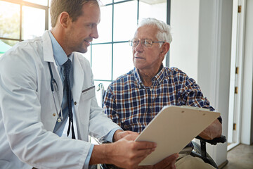 Doctor, man and wheelchair with clipboard in hospital for consulting, report or medical review....