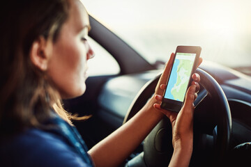 Phone screen, search and girl with map in car for travel, planning or checking traffic for road...