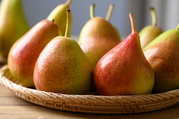 Fresh pear fruit in natural basket, Healthy fruit