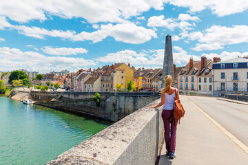Female on brige in city of France, Chalon sur saone, Bourgogne, Saone et Loire, Burgundy