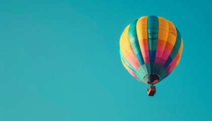 Obraz premium Vibrant Heights: A Stunning Hot Air Balloon Soaring in a Clear Blue Sky - AR 7:4