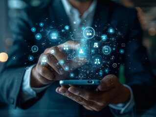 Fototapeta premium A businessman uses a smartphone, with digital icons and networks surrounding his hand. The concept of digital technology and the internet of things.