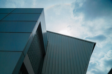 A building with a roof that has a rainbow on it