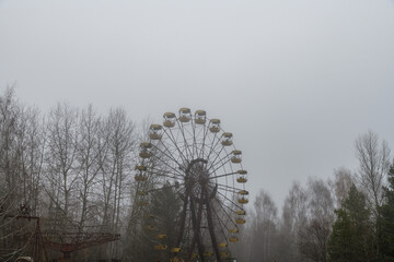 Ferris wheel in abandoned amusement park in a ghost town Pripyat, Ukraine. Chornobyl exclusion zone