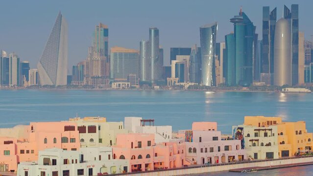 Doha, Qatar- Jan 14 2024, 4k, Aerial view of the Mina District, part of the port of Doha, with skyscrapers and buildings in the background, at daytime, Doha, Qatar