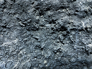 close up view old grunge wall with rough stone texture background