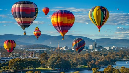 Fototapeta premium Up, Up, and Away: Vibrant Hot Air Balloons Take Flight Over Canberra