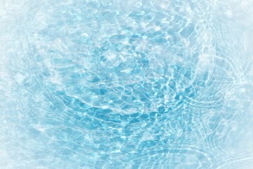 Obraz premium Blue water with ripples on the surface. Defocus blurred transparent blue colored clear calm water surface texture with splashes and bubbles. Water waves with shining pattern texture background.