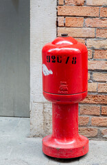 Red water hydrant on the street