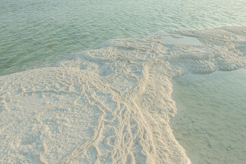 Dead Sea. Salt between water. Heat