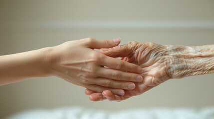 Fototapeta premium Closeup of loving couple holding hands while sick , Hand of young woman touching old woman in hospital