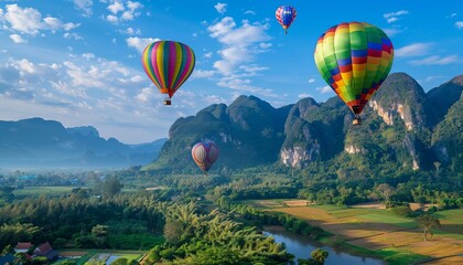 Obraz premium Serene Skies: A Spectacular Display of Colorful Hot Air Balloons Over Phu Langka National Park in Th