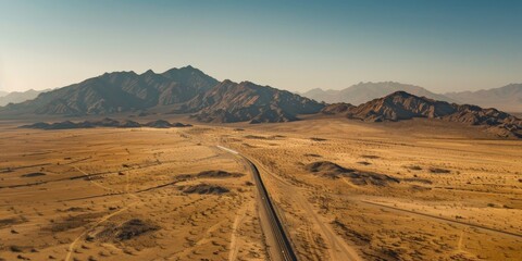 Panoramic view of a desert featuring a high-speed rail powered by renewable energy, connecting distant regions efficiently.