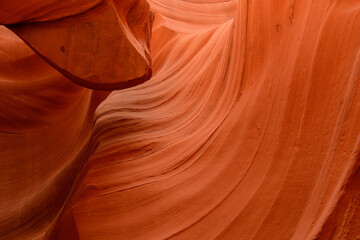 Orange colored rocks in the Lower Antelope Canyon, Arizona, USA. Abstract background.