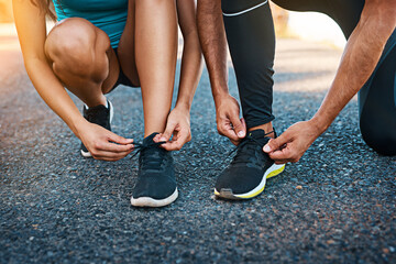 Outdoor, hands and tie shoes in road ready for fitness, exercise and training for wellness or...