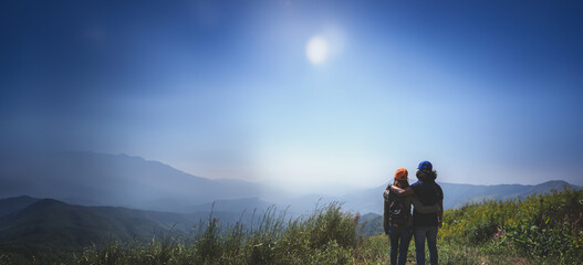 Lover women and men asians travel relax in the holiday. Stand up landscape on the Moutain. Mountain...