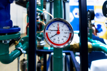 A pressure gauge with a scale for measuring the pressure of a liquid or gas in a confined space...