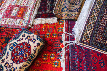 oriental Turkish handmade colorful carpets at the bazaar in Turkey in Istanbul