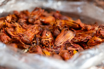 Closeup view of Jathipathri Mace spice in bulk