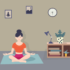 Young woman meditating while practicing yoga indoors