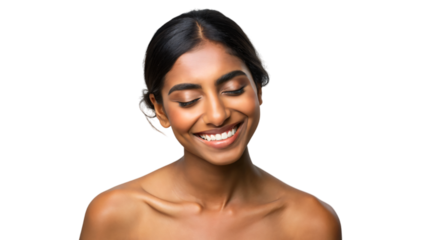 A close-up studio portrait of a smiling brunette Indian woman with long hair
