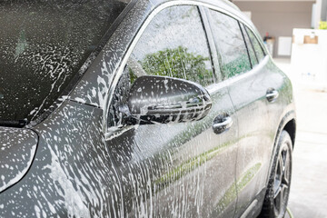 car cleaning and washing with foam soap