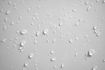 Water drops on white wall background texture