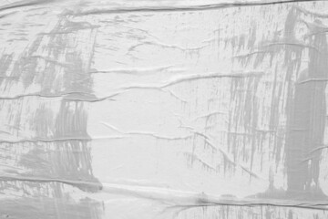 Gray color on white crumpled and creased paper poster texture background