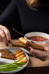 Ukrainian dish.  Borscht with meat and sour cream.