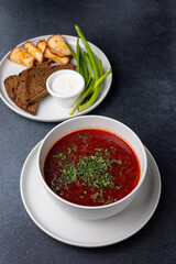 Ukrainian dish.  Borscht with meat and sour cream.