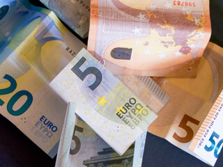 Economic Concept. A variety of Euro notes, representing financial diversity.