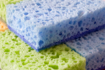 Washing Essentials. Colorful sponges with visible pores for scrubbing. Uses for Home maintenance...