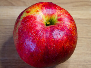 Appetizing Apple. A red apple with droplets, tempting and fresh.