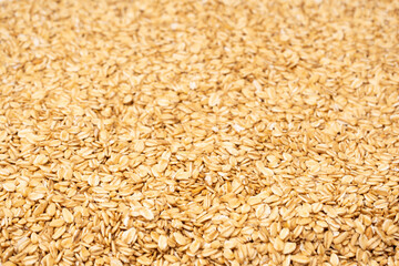 Oat-flakes as a background. Top view.
