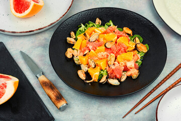 Salad with citrus fruits and seafood, breakfast.