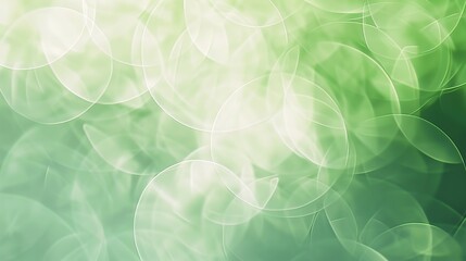 Soft blurred green circles overlapping in an ethereal, dreamy composition. 