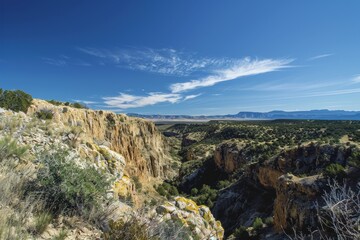 Vast Canyon Landscape with Clear Blue Sky for Text Overlay