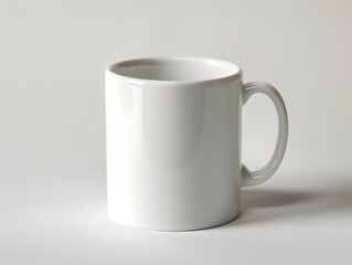 Obraz premium Simple White Ceramic Mug on Plain Background for Product Display or Branding Mockup