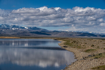 landscape of the surroundings of the village of Kosh Agach mountains with lakes and unusual landscapes in the southern regions of Altai in May