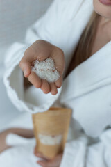 Bath time. Woman is taking bath. Beautiful young woman relaxing in bathroom.