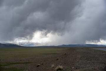 landscape of the surroundings of the village of Kosh Agach mountains with lakes and unusual landscapes in the southern regions of Altai in May