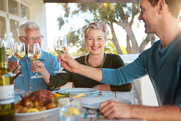 Cheers, wine and happy family in backyard lunch celebration, eating and bonding together at table....