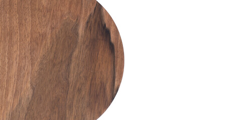 The rings are wooden. A section of the trunk of a walnut. The cut is wooden. On a wooden background