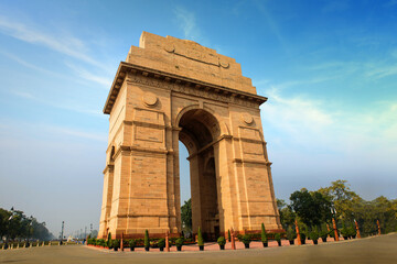 Magnificent structure of India Gate against blue sky. The India Gate is a war memorial located near the Kartavya path of New Delhi, formerly called Rajpath.