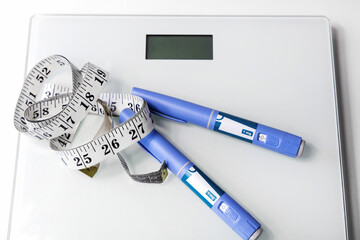  Ozempic Insulin injection pen for diabetics and weight loss. Concept of losing weight with the...
