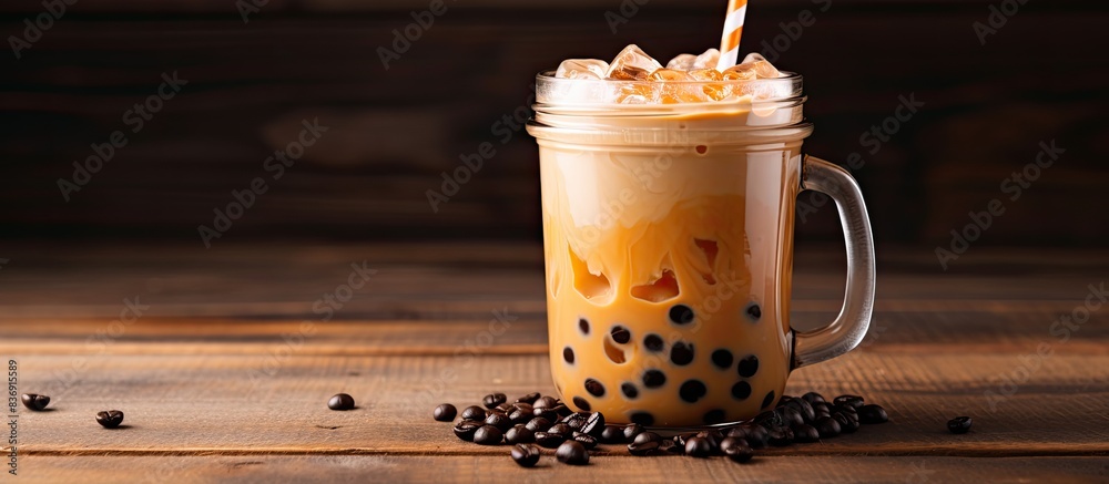 Aufkleber Bubble tea in a mason jar with tapioca pearls, presenting a delightful homemade drink in a rustic setting with copy space image.