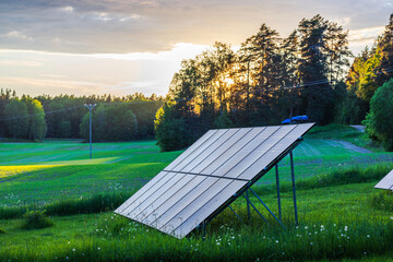 Close-up view of ground-mounted solar panels in the garden of a private villa. Sweden.