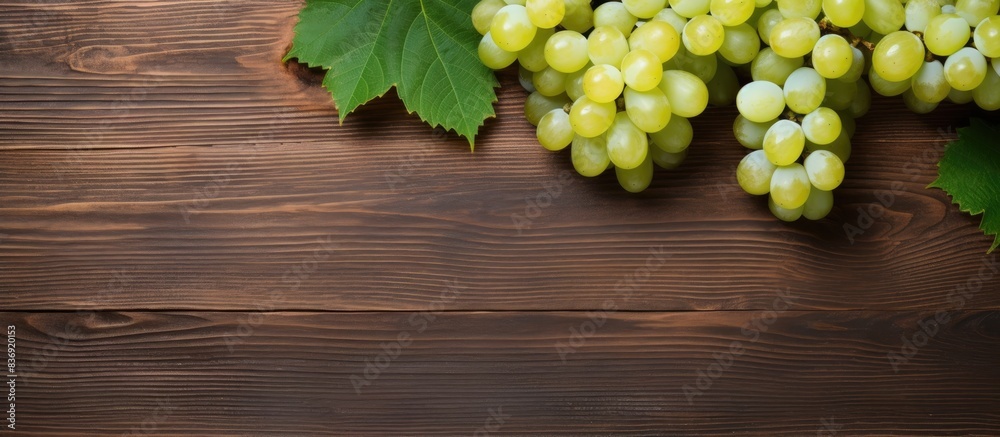 Aufkleber white table grapes on a rustic wooden background with copy space image.