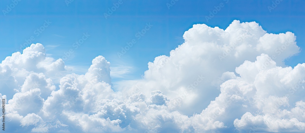 Aufkleber the scenic view of a clear blue sky with fluffy white clouds provides a calming backdrop for any cop