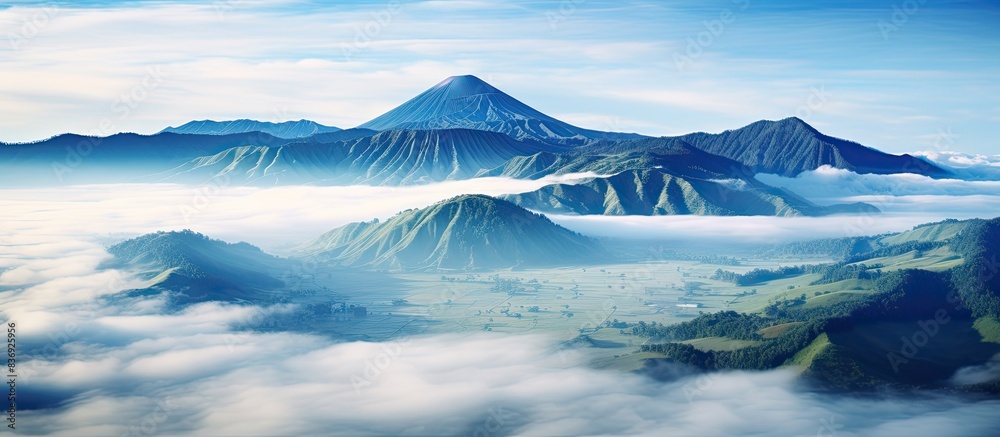 Poster mount bromo is often enveloped in morning fog, creating a picturesque scene that attracts many touri